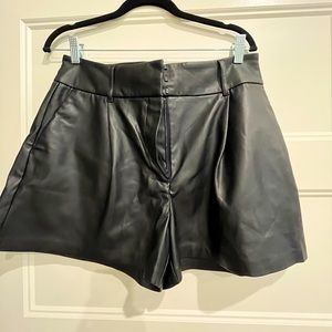 Womens Express faux leather dress shorts.